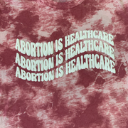 "Abortion Is Healthcare" Tie Dyed Unisex T-Shirt